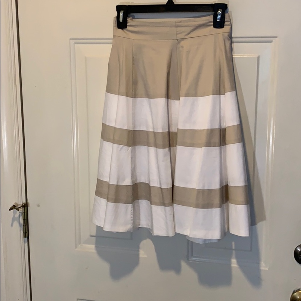 Beautiful A-line beige/white color blocked skirt.